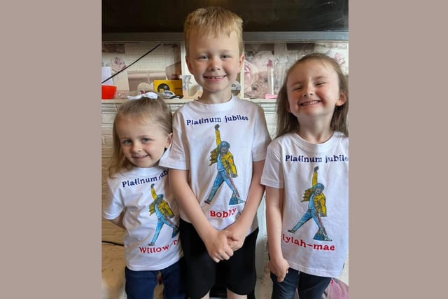 Willow-Rose, age 3, Bobby, age 7, Iylah-Mae, age 4, show off their custom t-shirts.