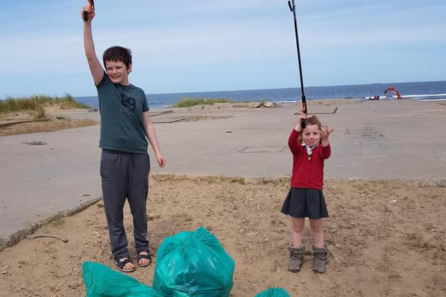 Fiona Murray is the mum of Niya. She said Niya was 'very enthusiastic' about collecting litter. Here is Niya with her brother Kieran.