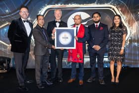 Seaton Tandoori staff celebrating receiving their Best Restaurant of the Year award for 2026.
