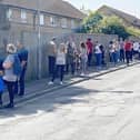 Members of the public queuing to use the walk-in Covid clinic in the car park at St Aidans Church, Hartlepool. Picture by FRANK REID