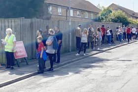Members of the public queuing to use the walk-in Covid clinic in the car park at St Aidans Church, Hartlepool. Picture by FRANK REID