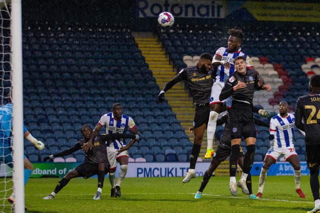 Rollin Menayese headed Hartlepool United into the lead against Rochdale. (Credit: Mike Morese | MI News)