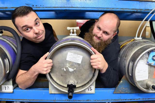 From left, the chairman of the Hartlepool Round Table, Peter Davies, and Kit Dodd from, the Three Brothers Brewing Company, set up one of the kegs in the Borough Hall ahead of the Hartlepool Round Table Beer Festival. Picture by FRANK REID.