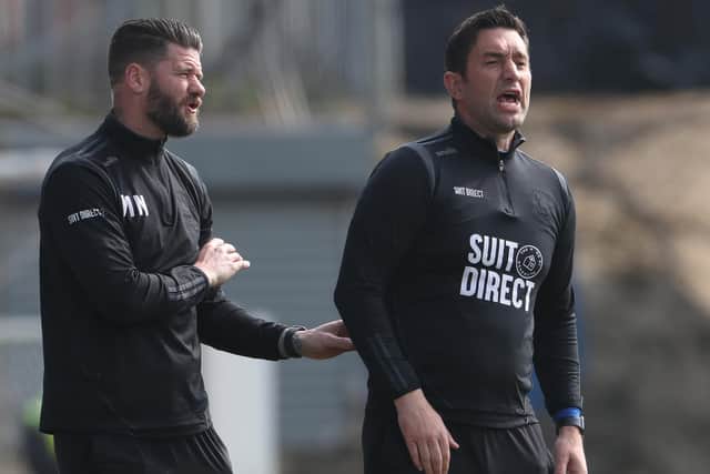 Hartlepool United manager Graeme Lee and assistant manager Michael Nelson during the League Two match with Port Vale. (Credit: Mark Fletcher | MI News)