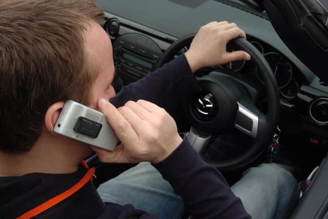 Fine for mobile phone drivers.