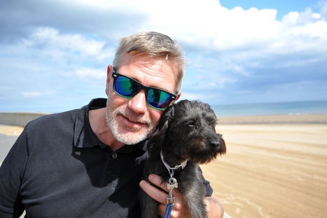 Peter Wilthew and Stella pose for their photograph at Seaton Carew.