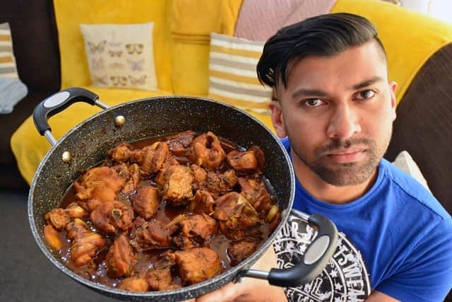 Duran with Trinidadian stewed chicken.