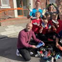 Pupils and staff from Brougham Primary School with some of the recycled with Karl Gippert from Thirteen, Chris Murray from FC Hartlepool (right) and Jade Bromby (back left) from The Annexe.