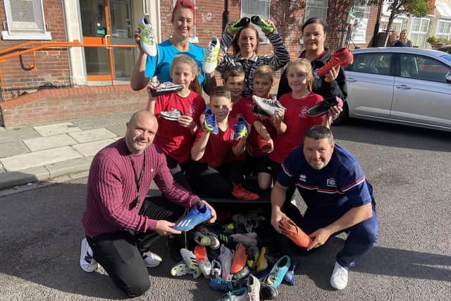 Pupils and staff from Brougham Primary School with some of the recycled with Karl Gippert from Thirteen, Chris Murray from FC Hartlepool (right) and Jade Bromby (back left) from The Annexe.