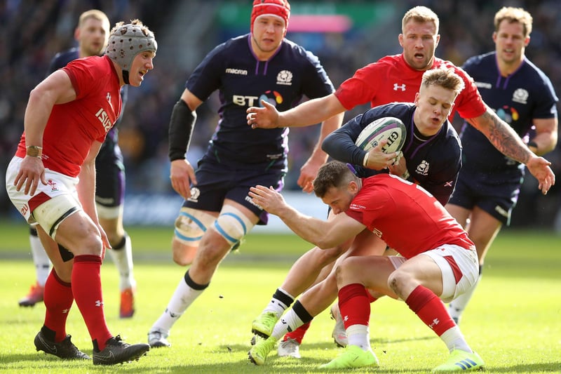 Darcy Graham being tackled during the Guinness Six Nations match between Scotland and Wales at Murrayfield on March 09, 2019, in Edinburgh. (Photo by Ian MacNicol/Getty Images)