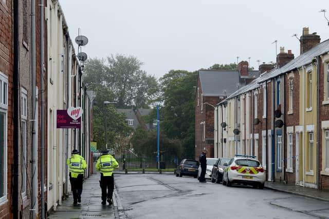 Police in Rydal Street, Hartlepool, during their 2019 investigation into the murder of Michael Phillips.