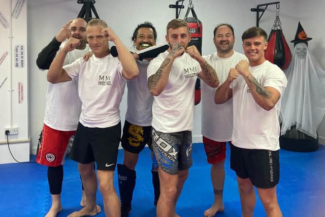 Hartlepool MMA members (front left to right) Michael McMurray, Scott Watson and Oliver McMillan with their instructors (back left to right) Paul Davies, Jae Shinn and Russell Phillips.