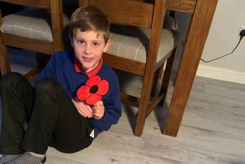 Harry with one of his poppies.