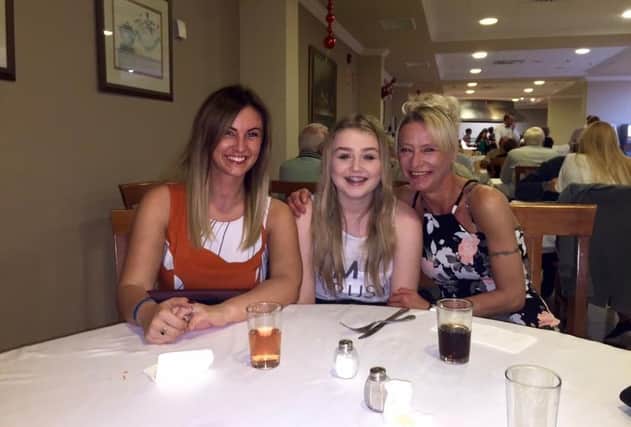 Rachel Carr with her sister Chloe Harness and mam Wendy Cook.