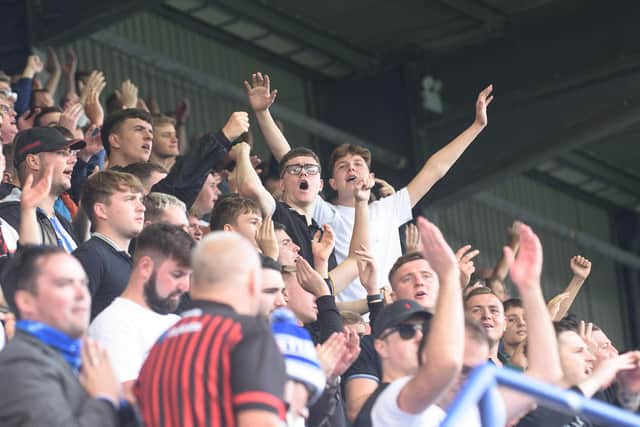 Hartlepool fans try and motivate the team  during the Sky Bet League 2 match between Tranmere Rovers and Hartlepool United at Prenton Park, Birkenhead on Saturday 4th September 2021. (Credit: Ian Charles | MI News)