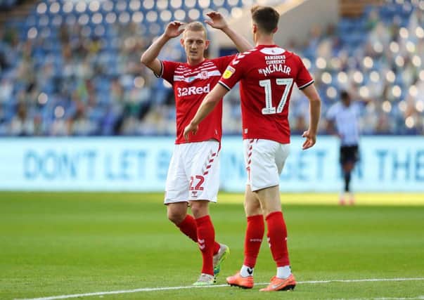 Paddy McNair is congratulated by George Saville after Middlesbrough's first goal against Sheffield Wednesday.