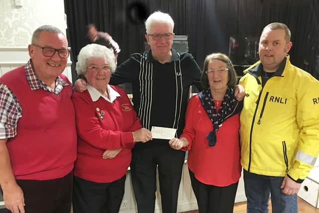 Pictured during the cheque presentation are Colin Griffiths, left, and John Denholm, of the Hartlepool Clubs' Consultative Committee, with Ann Wray and Beryl Sherry, second right, of the Hartlepool RNLI Enterprise Branch, and Hartlepool RNLI crew member Glen Pearson, right.