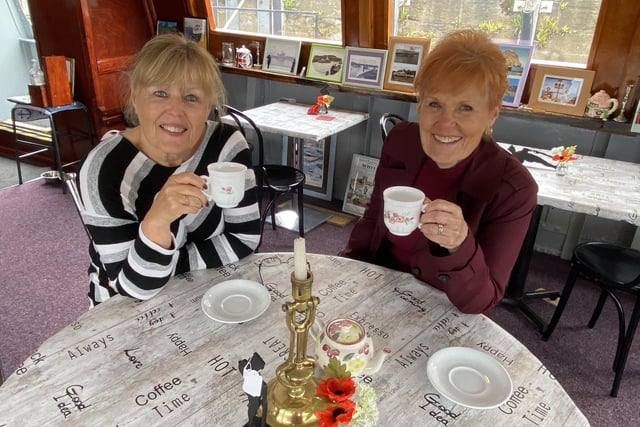 Margaret Laycock (left) and Chris Gallagher enjoy a cup of tea at the Little Dunkirk Tea Rooms reopening day in 2021.