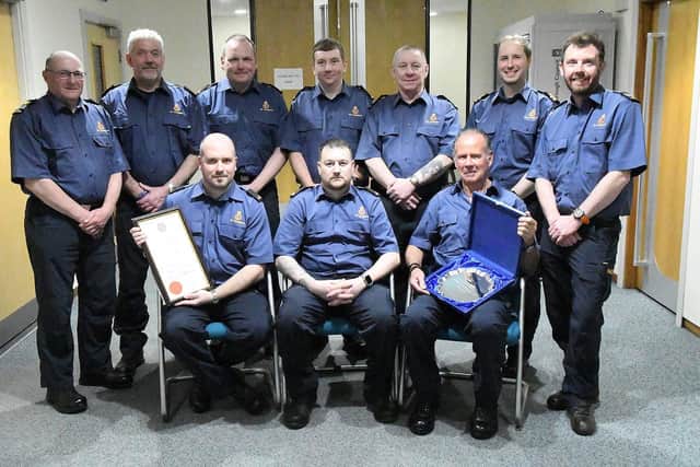 The Hartlepool Coastguard team with their Freedom of the Borough of Hartlepool certificate and award at the Civic Centre.