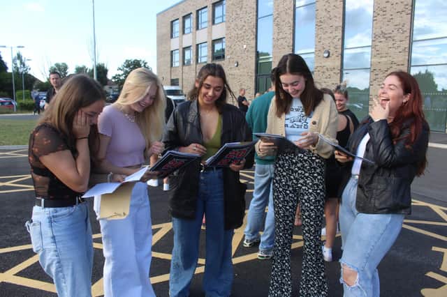 English Martyrs students receive their A-level results.
