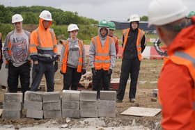 John Cartwright with some of the bricklaying students at Hartlepool College