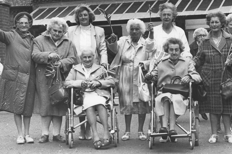 Residents from the Owton Manor care home are pictured holding their Union Jack flags at Hartlepool railway station as they try and get a glimpse of prince Charles in 1988.
