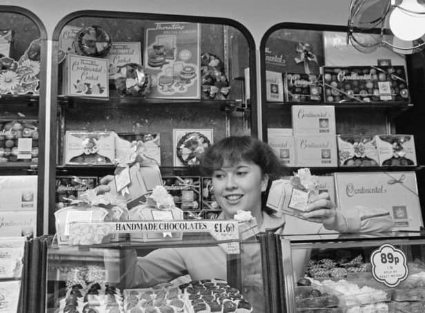 It's World Chocolate Day - and we've been hearing about your favourite retro chocolate bars. Manning the chocolate counter in May 1985. Picture: R. Brigden/Daily Express/Hulton Archive/Getty Images.