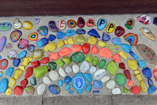 Pebbles and stones painted by villagers during the pandemic have been set in concrete at Hart Primary School