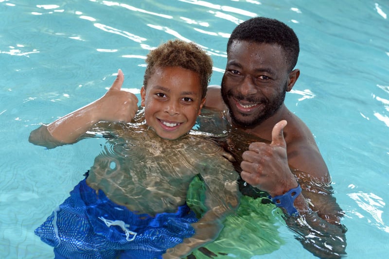 Haruna Adama, pictured with his son Lenny Adama, nine.