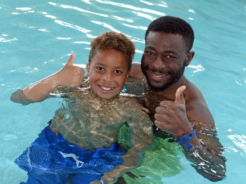 Haruna Adama, pictured with his son Lenny Adama, nine.