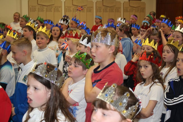 Pupils wear crowns during their party at Throston Primary School.