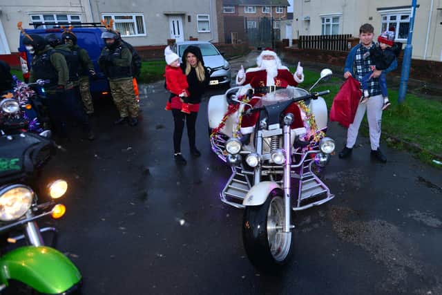 Noah Griffiths and his family on the day a motor bike cavalcade came to his house at Christmas last year.