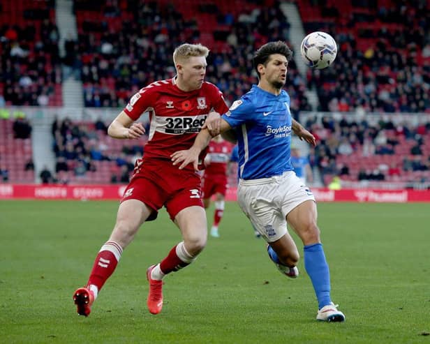 Josh Coburn (L) of Middlesbrough in action with George Friend of Birmingham City . (Photo by Nigel Roddis/Getty Images)