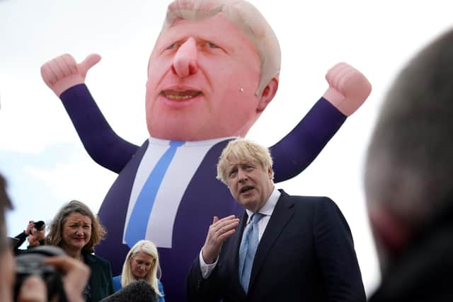 Prime Minister Boris Johnson next to a giant inflatable of himself during a visit to Hartlepool after Conservative candidate Jill Mortimer won the Hartlepool by-election in May.