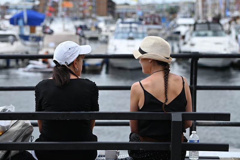 Friends enjoy the peace and quiet of the harbour.