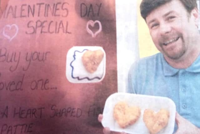 Kevin Turton with the heart-shaped fish patties.