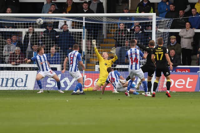 George Thomson of Harrogate scores their first goal  during the Sky Bet League 2 match between Hartlepool United and Harrogate Town at Victoria Park, Hartlepool on Sunday 24th October 2021. (Credit: Mark Fletcher | MI News)