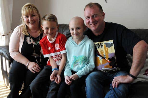 Rebecca with mum Tracy, dad Paul and brother Jake, 12.