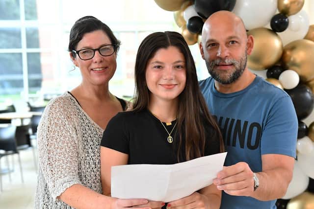 Hartlepool Sixth Form College student Charlotte Hamilton with mum Andrea and dad Morgan after she collected her A-level results. Picture by FRANK REID