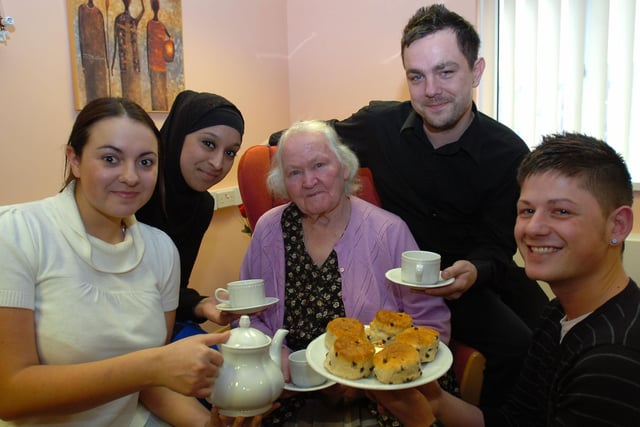 Laura Corrigan, Rukiha Hussain, Shaun Webb and Andrew Hughes serve afternoon tea to Hartlepool and District Hospice patinet, Margaret Hoogendan.