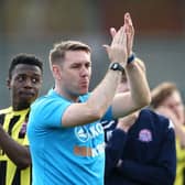 AFC Fylde manager Dave Challinor applauds the fans during the Vanarama National League match between Salford City and AFC Fylde at Moor Lane on April 22, 2019 in Salford, England. (Photo by Jan Kruger/Getty Images)