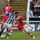 Mark Shelton of Hartlepool United battles with Crawley Town's Owen Gallacher during the Sky Bet League 2 match between Hartlepool United and Crawley Town at Victoria Park, Hartlepool on Saturday 7th August 2021. (Credit: Mark Fletcher | MI News)
