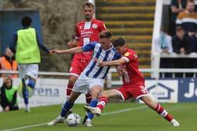 Mark Shelton of Hartlepool United battles with Crawley Town's Owen Gallacher during the Sky Bet League 2 match between Hartlepool United and Crawley Town at Victoria Park, Hartlepool on Saturday 7th August 2021. (Credit: Mark Fletcher | MI News)