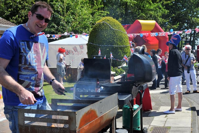 Gary Downes working his magic on the barbecue during the Jubilee street party at Frensham Drive in 2012.