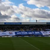 Hartlepool United's fans unfurl a banner before the Sky Bet League 2 match between Hartlepool United and Carlisle United at Victoria Park, Hartlepool on Saturday 8th October 2022. (Credit: Mark Fletcher | MI News)