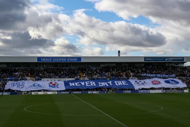 Hartlepool United's fans unfurl a banner before the Sky Bet League 2 match between Hartlepool United and Carlisle United at Victoria Park, Hartlepool on Saturday 8th October 2022. (Credit: Mark Fletcher | MI News)