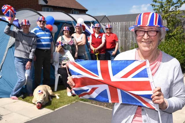Margaret Turnedge and her guests Annette Turnedge, Brian Heseltine, Margaret Jarhan, Susan Stamper, Doreen Sharpe, Elizabeth Wright and Louise Wright celebrate in the Jubilee Day sunshine at Chatham Road. Picture: Ian McClelland
