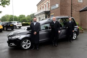 Stephen Laughton with his son's Daniel (left) and Craig (right) outside Co-op Funeralcare at Strathmore House, Hartlepool. Picture by FRANK REID