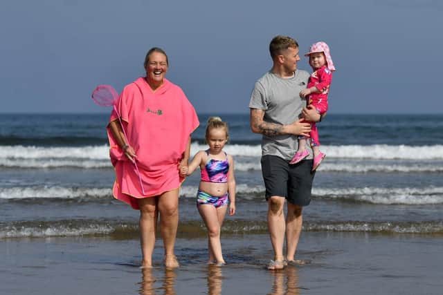 From left,  Susie, Aila, Dan and Ottilie enjoy a visit to Seaton Carew during the warm weather this week. Picture by FRANK REID
