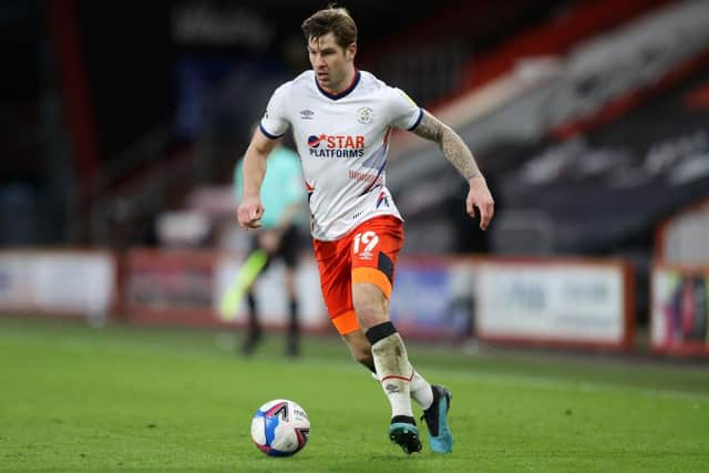 James Collins playing for Luton Town.